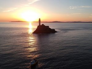 Fastnet lighthouse and Boat Charter