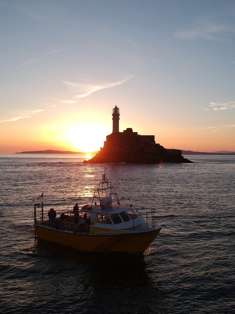 Fastnet lighthouse and Boat Charter
